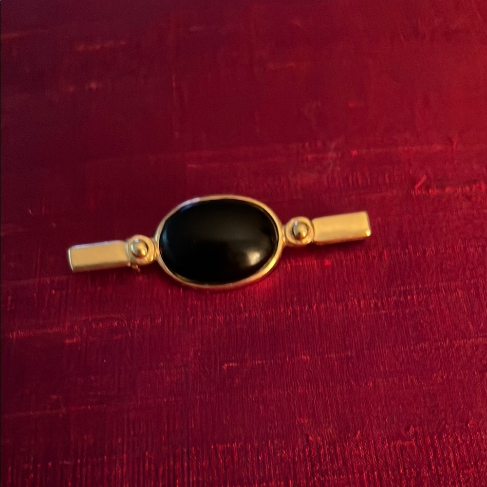 Elegant Black and Gold Women's Pin